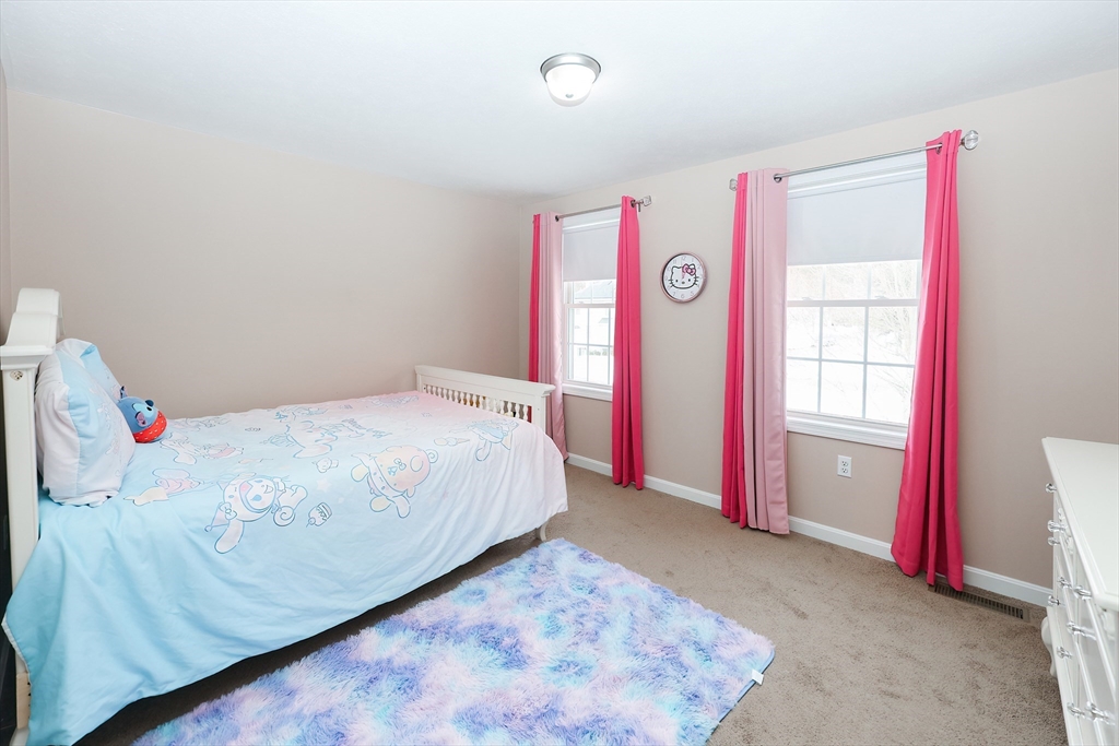 31 Bufton Farm Road Clinton, MA 01510 - Photo 22 of 37 a bed room with a bed and a window