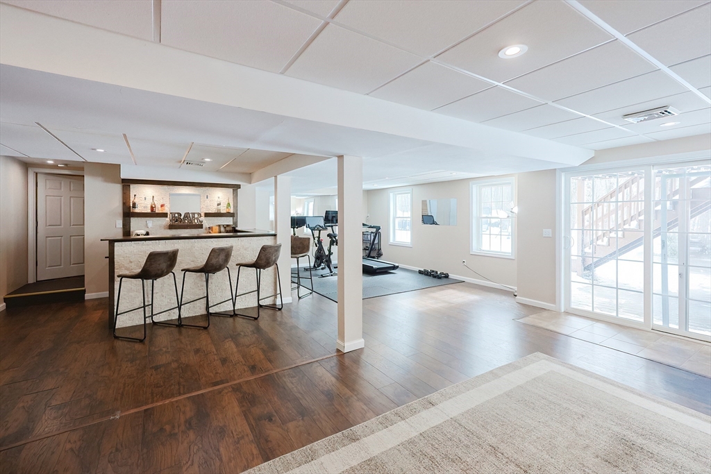 31 Bufton Farm Road Clinton, MA 01510 - Photo 24 of 37 a view of a living room kitchen and a large window