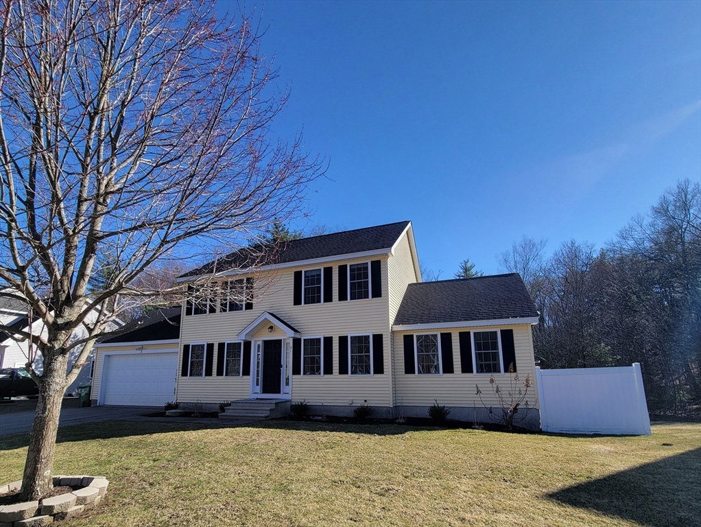 31 Bufton Farm Road Clinton, MA 01510 - Photo 37 of 37 a front view of a house with a yard and lake view