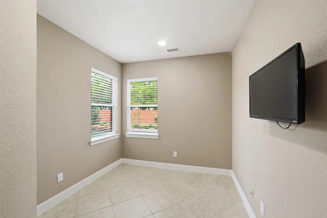 an empty room with windows