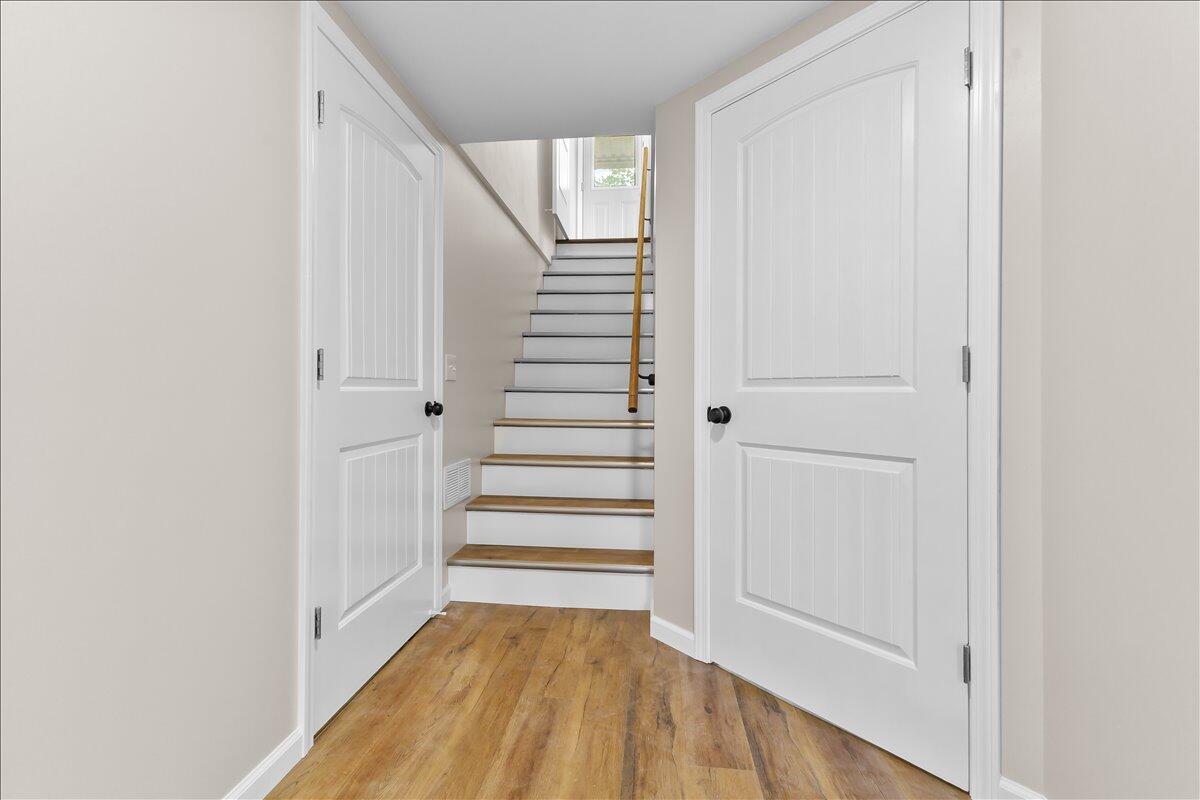 2646 Dickerson Mill Road Bedford, VA 24523 - Photo 25 of 46 a view of a hallway with wooden floor and entryway
