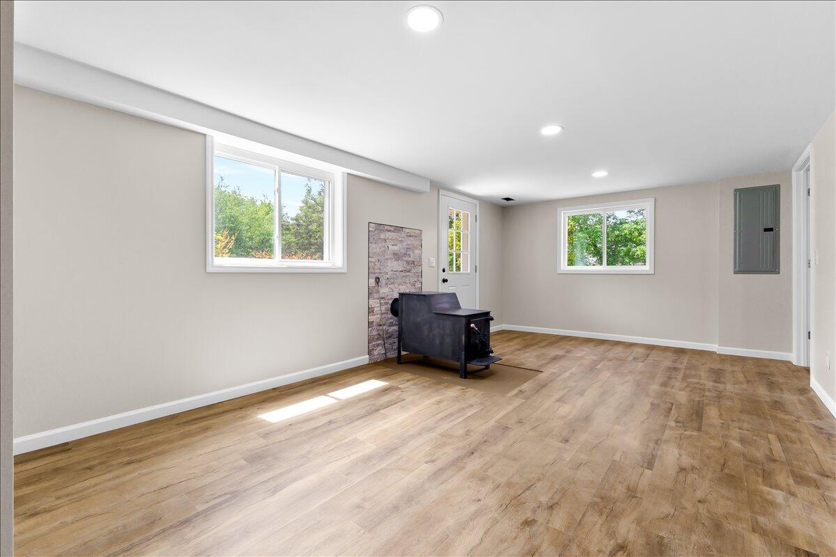 2646 Dickerson Mill Road Bedford, VA 24523 - Photo 28 of 46 a living room with furniture and a window