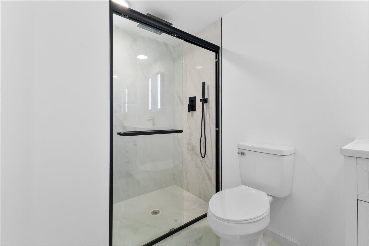 2646 Dickerson Mill Road Bedford, VA 24523 - Photo 32 of 46 a bathroom with a glass shower door