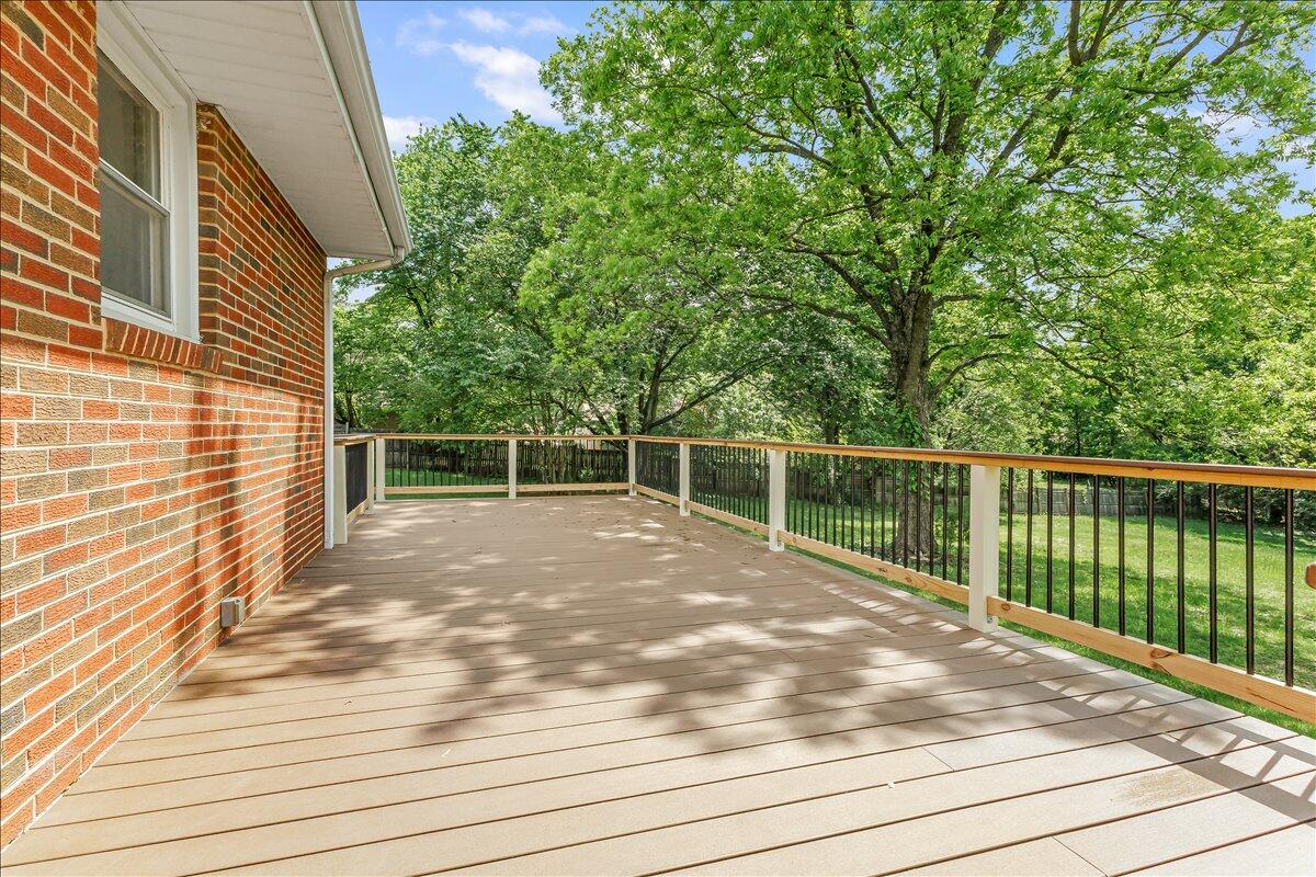 2646 Dickerson Mill Road Bedford, VA 24523 - Photo 38 of 46 a view of a backyard and floor to ceiling window