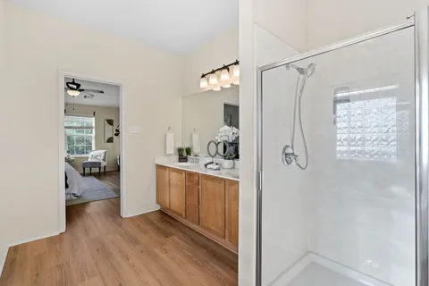 a view of kitchen with livingroom and hardwood floor