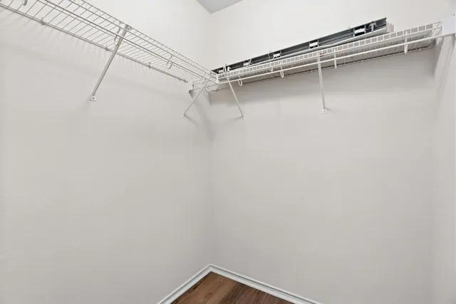a view of a room with racks on the wall
