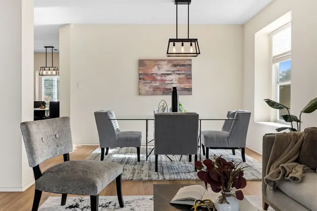 a view of a dining room with furniture window and outside view