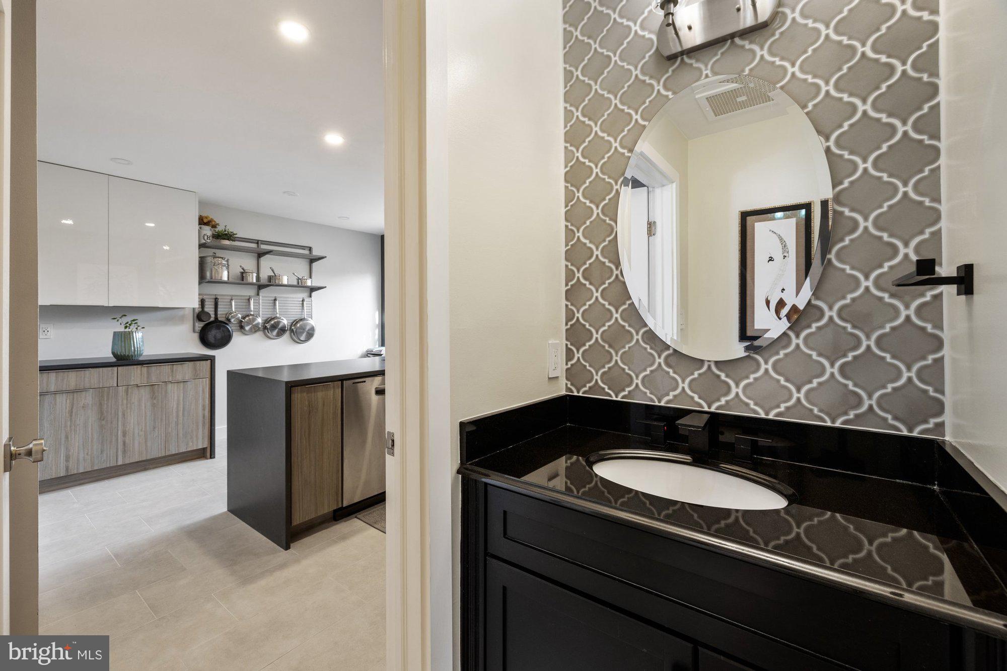11120 Harbor Court, Unit 1120 Reston, VA 20191 - Photo 21 of 55 a kitchen with a sink and a stove