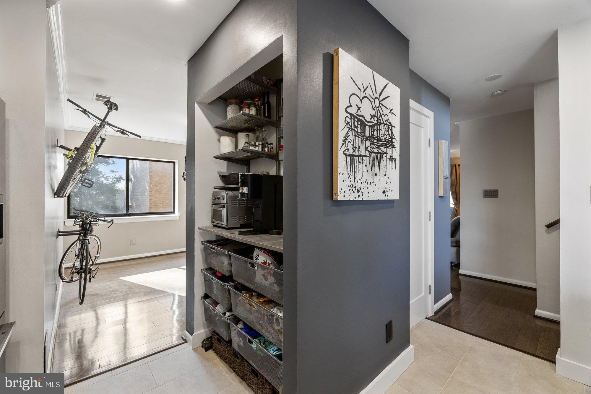 11120 Harbor Court, Unit 1120 Reston, VA 20191 - Photo 22 of 55 a view of walk in closet with clothes and shoes