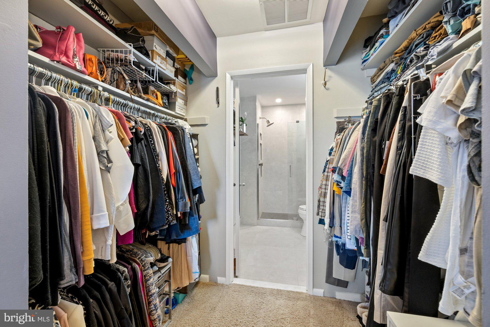 11120 Harbor Court, Unit 1120 Reston, VA 20191 - Photo 30 of 55 a view of walk in closet with clothes