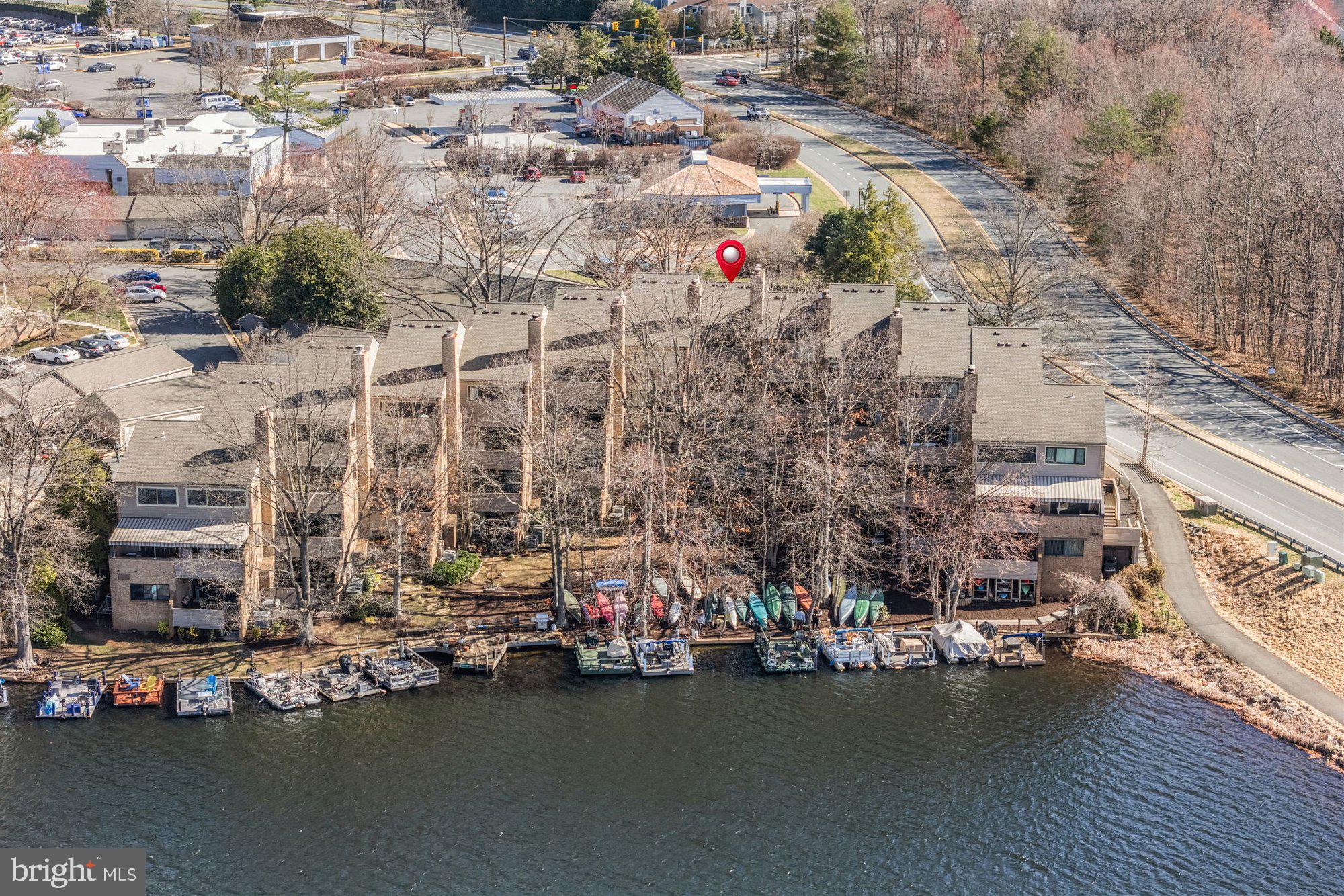 11120 Harbor Court, Unit 1120 Reston, VA 20191 - Photo 3 of 55 a view of a city with tall buildings