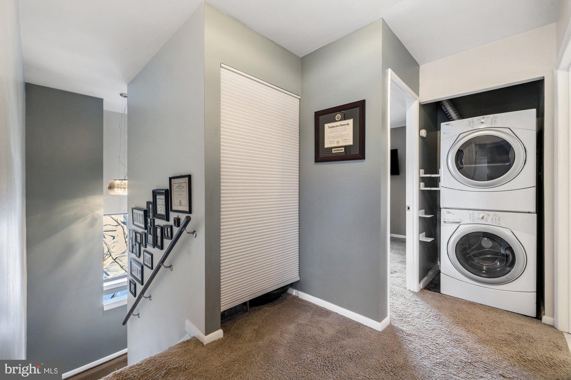 11120 Harbor Court, Unit 1120 Reston, VA 20191 - Photo 37 of 55 a view of a livingroom with a washer and dryer