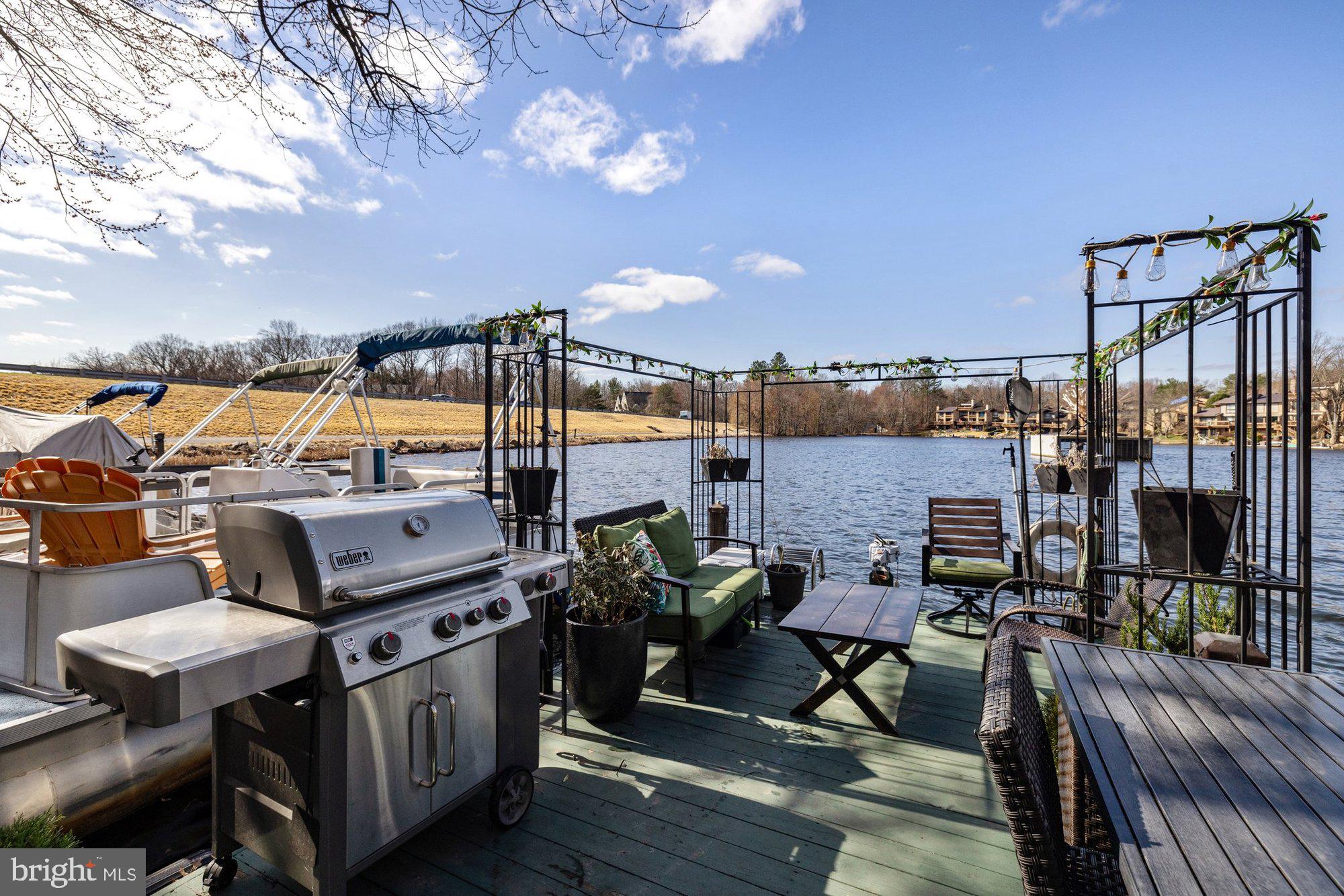 11120 Harbor Court, Unit 1120 Reston, VA 20191 - Photo 43 of 55 a terrace with outdoor seating and city view