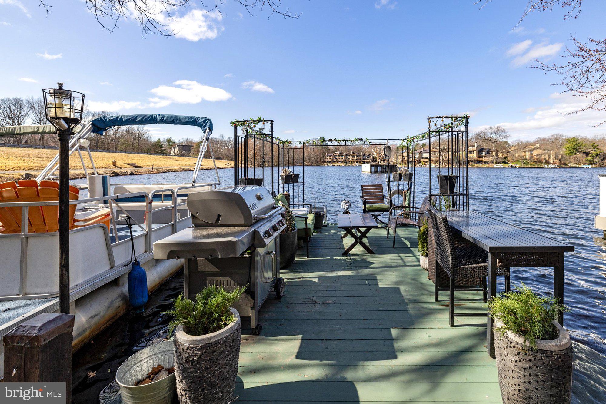 11120 Harbor Court, Unit 1120 Reston, VA 20191 - Photo 55 of 55 a terrace with outdoor seating and city view