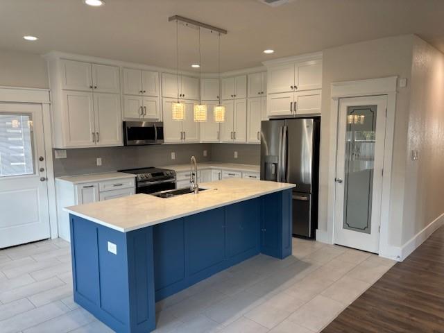 4707 Chapman Street Fort Worth, TX 76105 - Photo 8 of 21 a kitchen with stainless steel appliances granite countertop a refrigerator a stove a sink and a oven