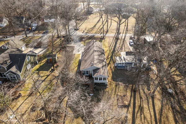 a backyard of a house with lots of green space