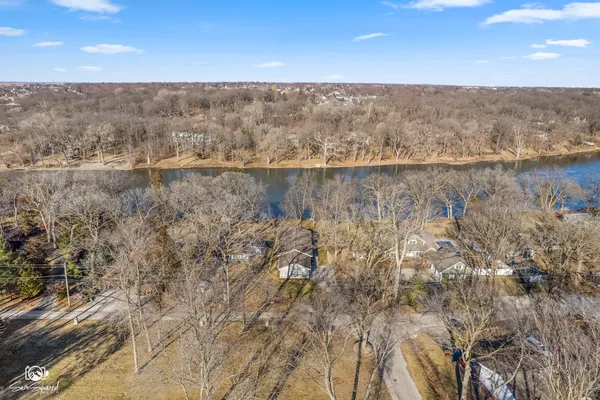 a view of a city street and trees