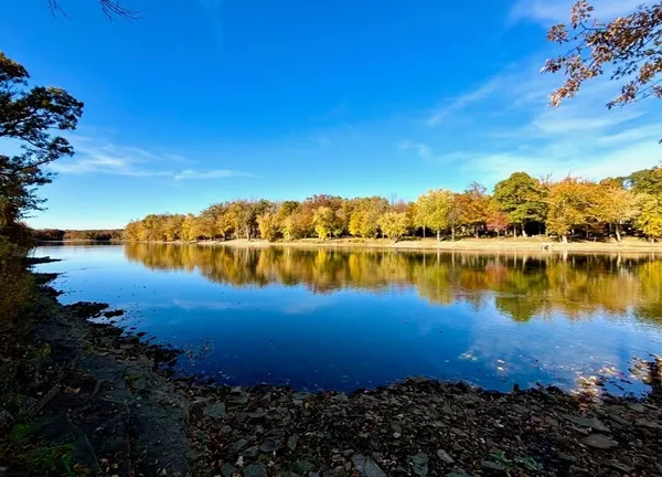 a view of a lake with outdoor space