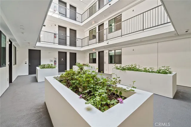 front view of a house with a large window