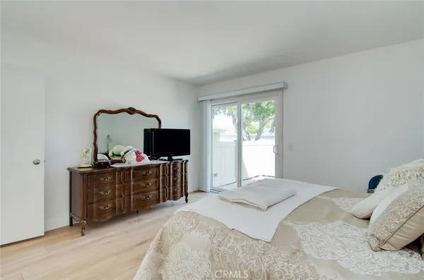a bathroom with a sink vanity and mirror