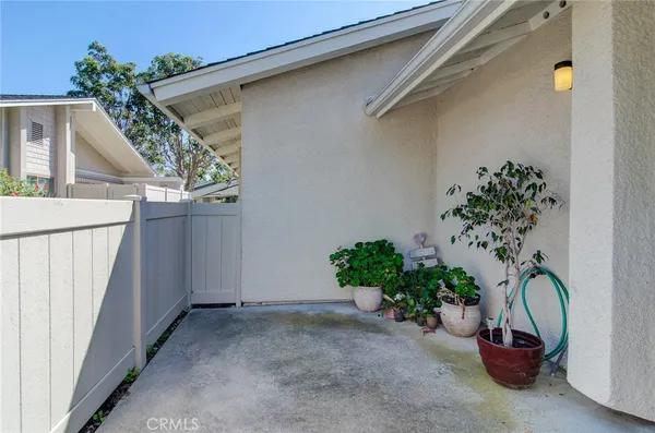 a view of a house with a tree