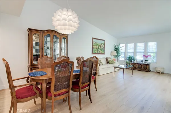 a kitchen with stainless steel appliances a refrigerator sink and microwave