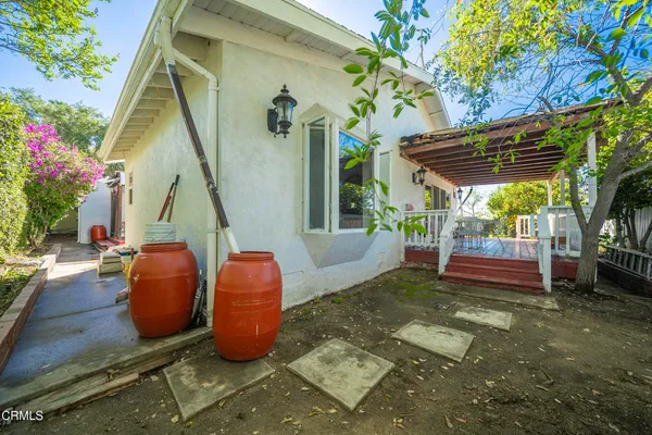 a backyard of a house with seating space