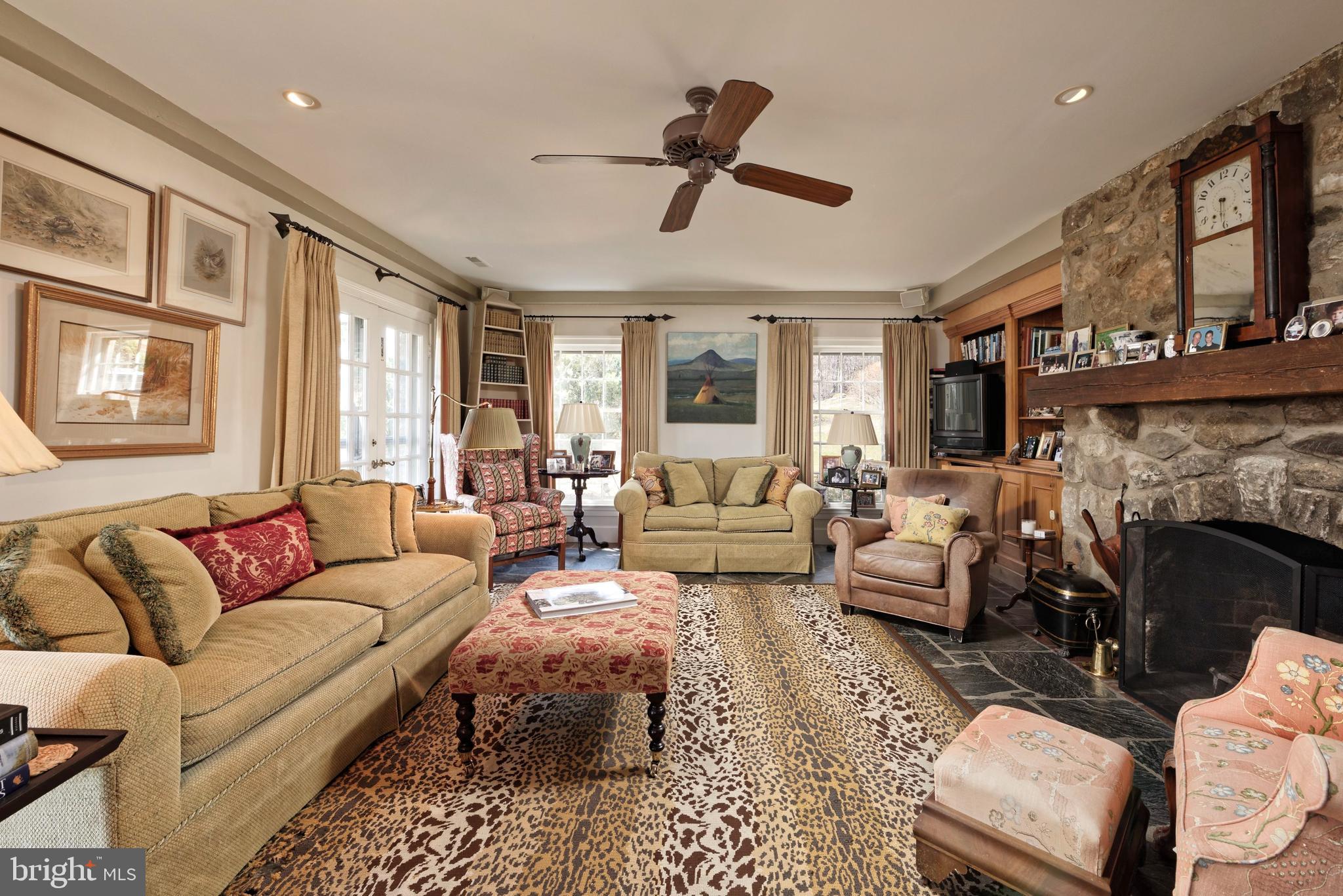 4392 Carrington Road Markham, VA 22643 - Photo 13 of 59 Family rm w/built-ins, fireplace & doors to patio