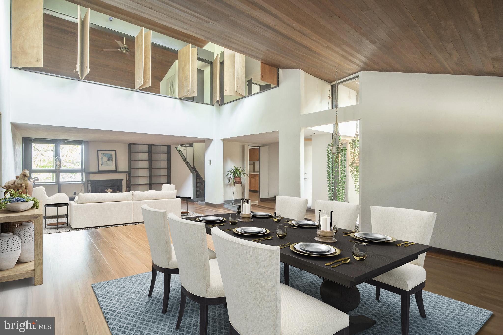 195 Lafayette Street Doylestown, PA 18901 - Photo 12 of 18 a dining room with furniture wooden floor and a chandelier