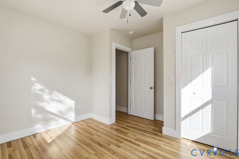 6010 Golden Wheel Road Providence Forge, VA 23140 - Photo 31 of 49 a view of an empty room and window with wooden floor