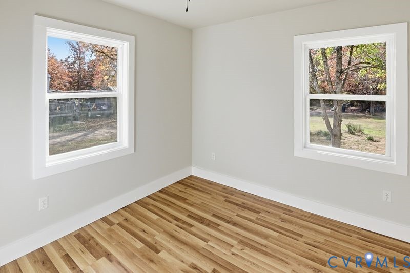 6010 Golden Wheel Road Providence Forge, VA 23140 - Photo 32 of 49 a view of a room with wooden floor and window