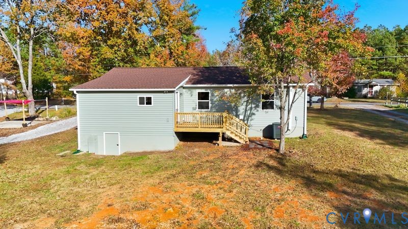 6010 Golden Wheel Road Providence Forge, VA 23140 - Photo 40 of 49 a view of a house with a yard