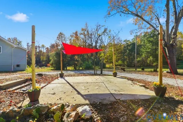 a view of a swimming pool with a bench