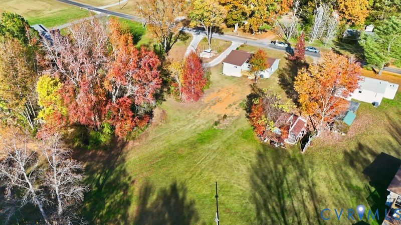 6010 Golden Wheel Road Providence Forge, VA 23140 - Photo 49 of 49 a backyard of a house with lots of green space
