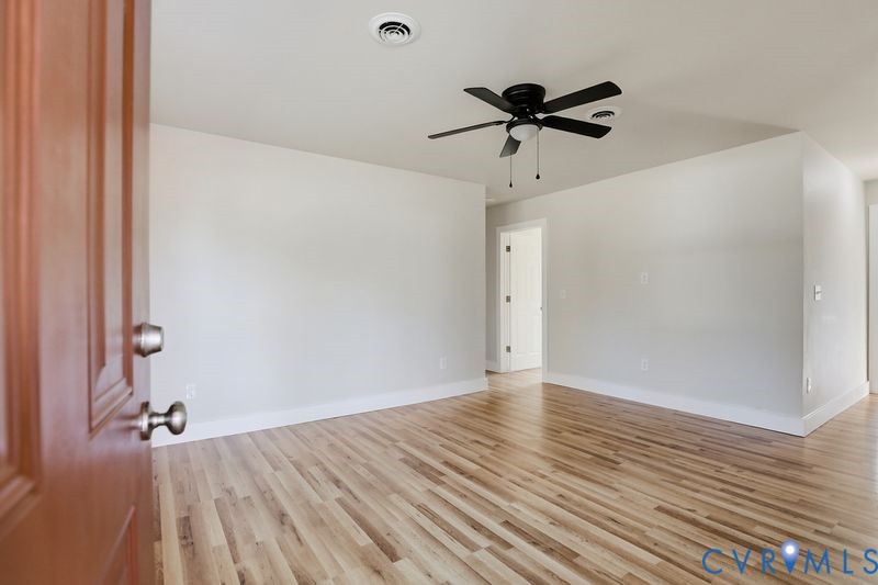 6010 Golden Wheel Road Providence Forge, VA 23140 - Photo 8 of 49 a view of empty room with wooden floor