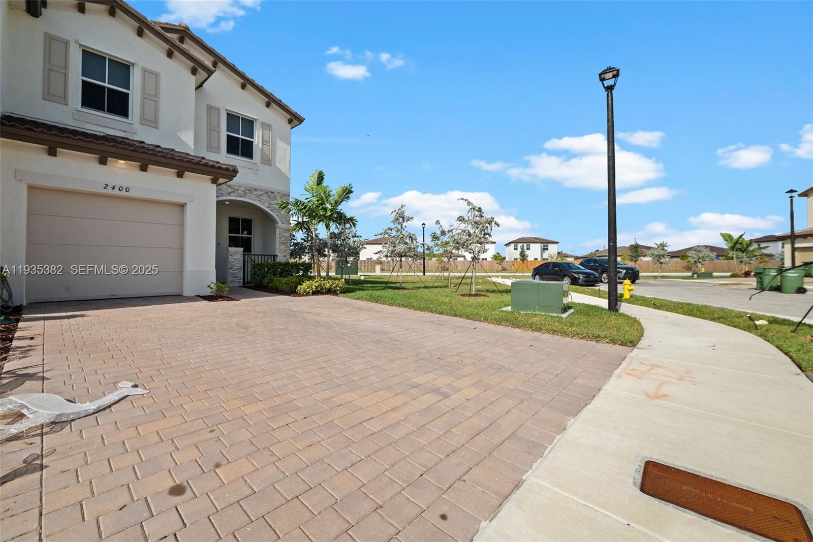 2400 Southeast 29th Street Homestead, FL 33035 - Photo 2 of 25 a view of a house with a yard