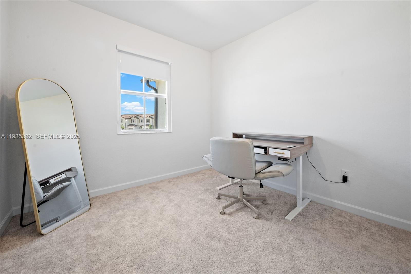2400 Southeast 29th Street Homestead, FL 33035 - Photo 21 of 25 a workspace with furniture and a window