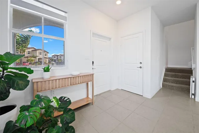 a view of entryway with wooden floor