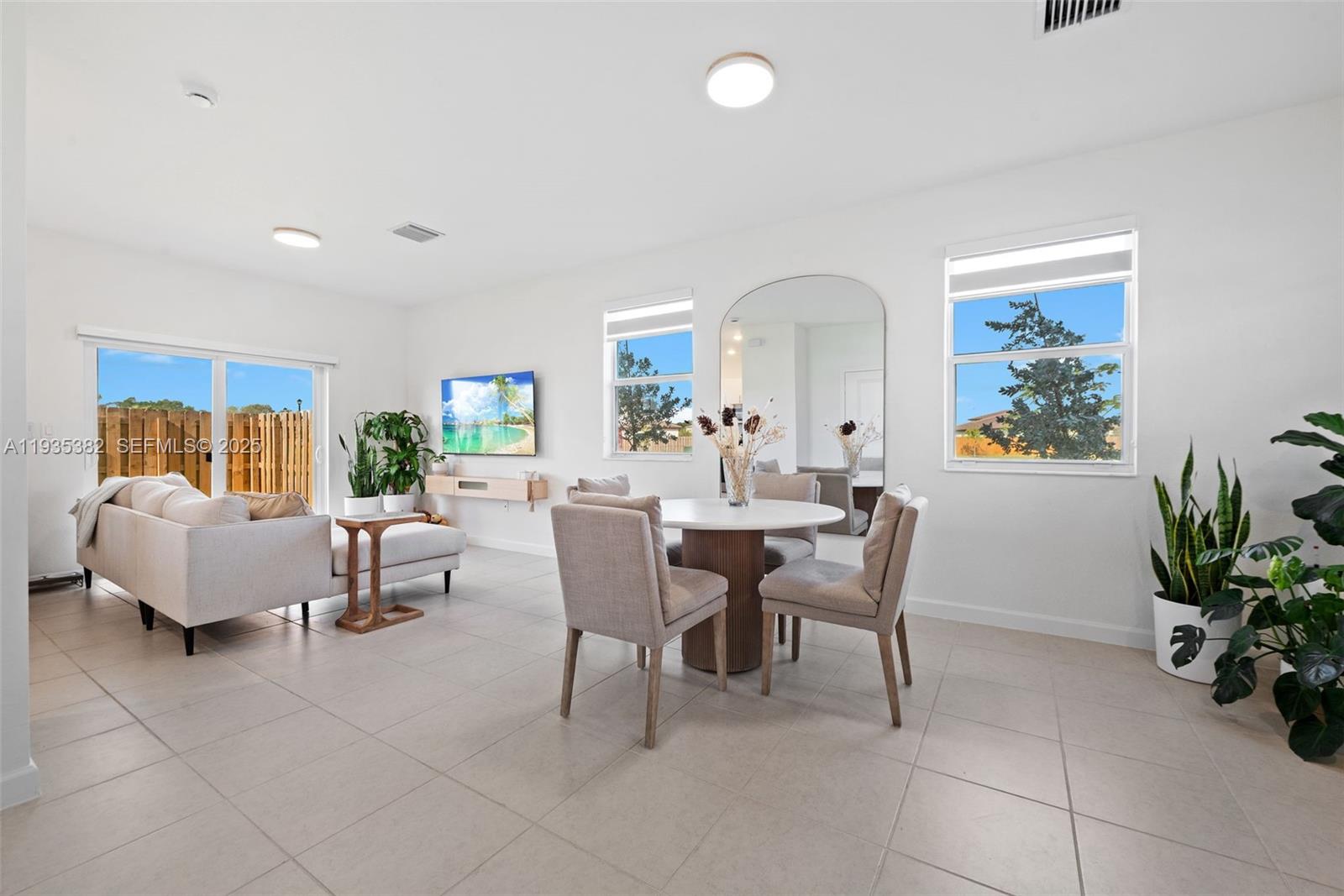 2400 Southeast 29th Street Homestead, FL 33035 - Photo 6 of 25 a dining room with furniture and wooden floor