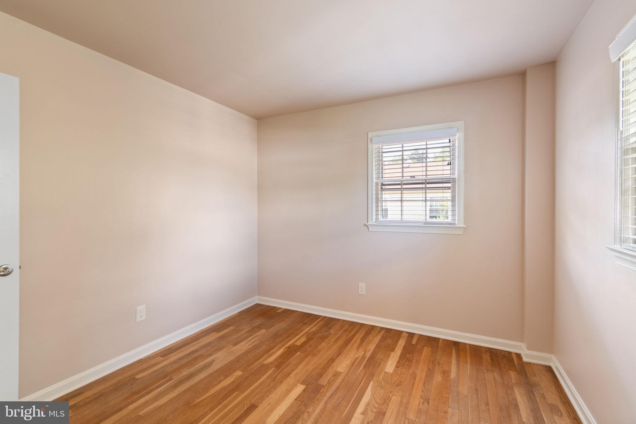 7619 Hayfield Road Alexandria, VA 22315 - Photo 36 of 60 Third bedroom with hardwood floors