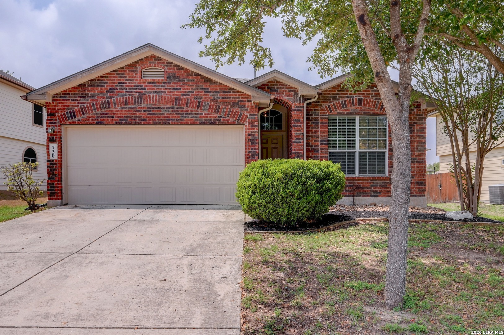 720 Hollow Ridge Schertz, TX 78108 - Photo 2 of 27 a front view of a house with garden