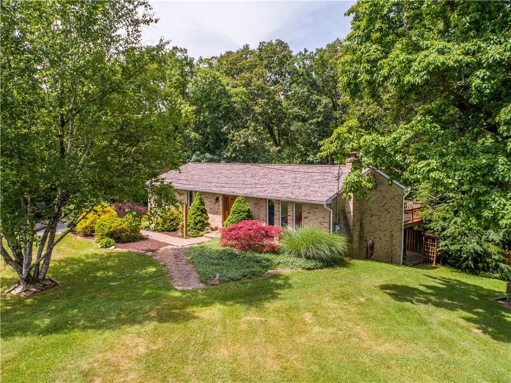 119 A Singleton Road Sarver, PA 16055 - Photo 2 of 22 The immaculate landscaping is sure to welcome any of your guests.