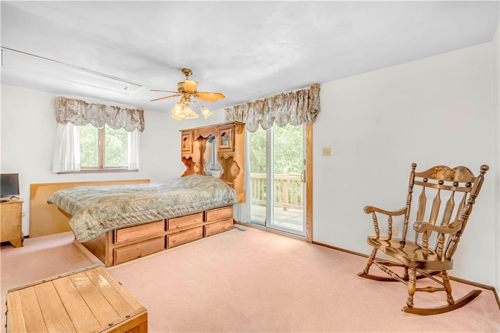 119 A Singleton Road Sarver, PA 16055 - Photo 12 of 22 Enjoy coffee out on the private deck. The master bedroom is complete with a full bath.