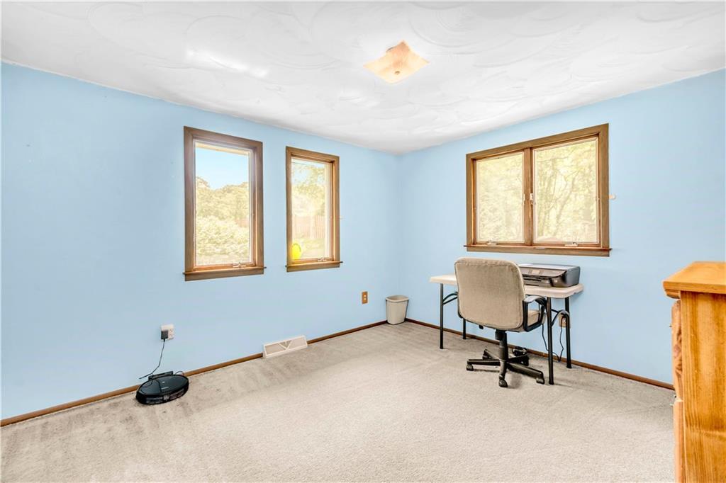 119 A Singleton Road Sarver, PA 16055 - Photo 13 of 22 This bedroom has an abundance of light and plenty of space.