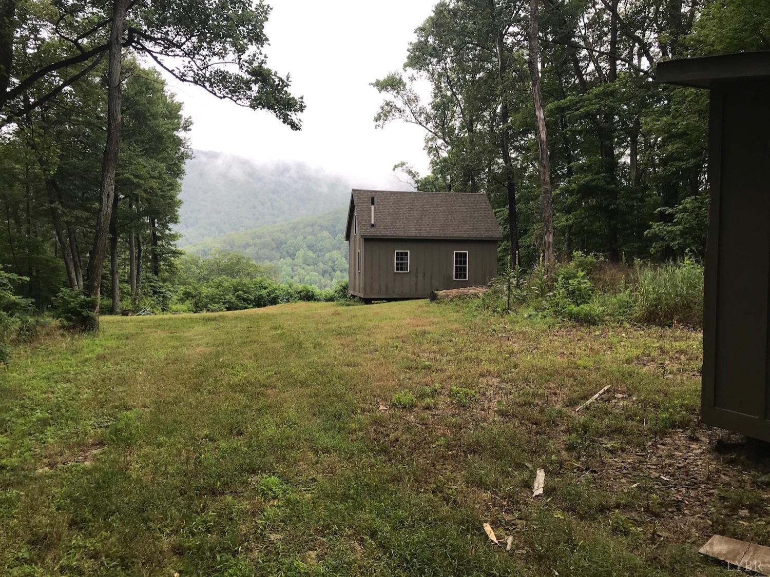 300 Scotts Branch Road Amherst, VA 24521 - Photo 5 of 16 a house view with a garden space