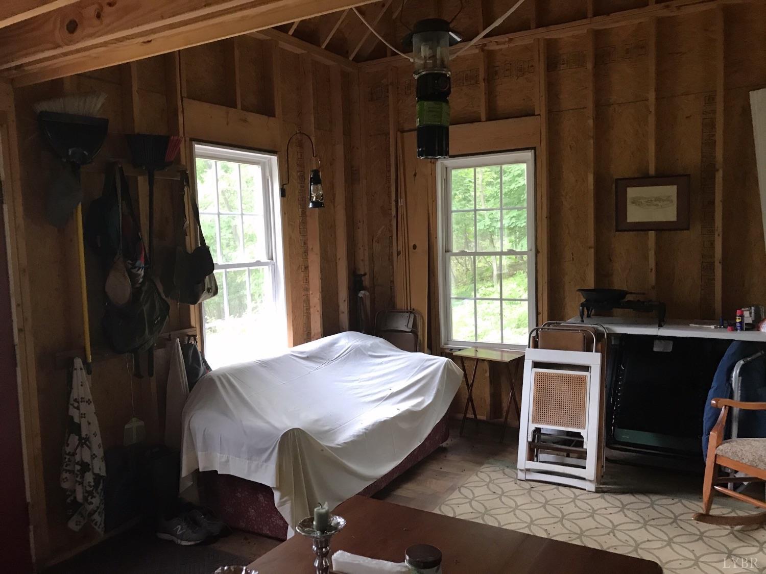 300 Scotts Branch Road Amherst, VA 24521 - Photo 10 of 16 a bedroom with a bed and a window