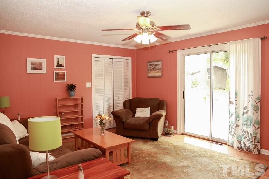 1501 Kelly Road Garner, NC 27529 - Photo 11 of 25 a view of a livingroom with furniture and a window
