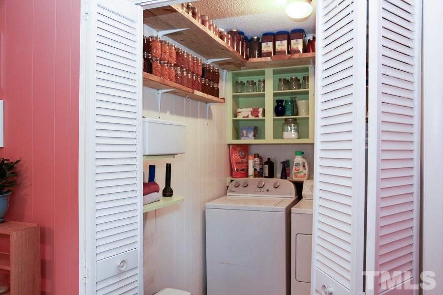 1501 Kelly Road Garner, NC 27529 - Photo 14 of 25 a utility room with dryer and washer