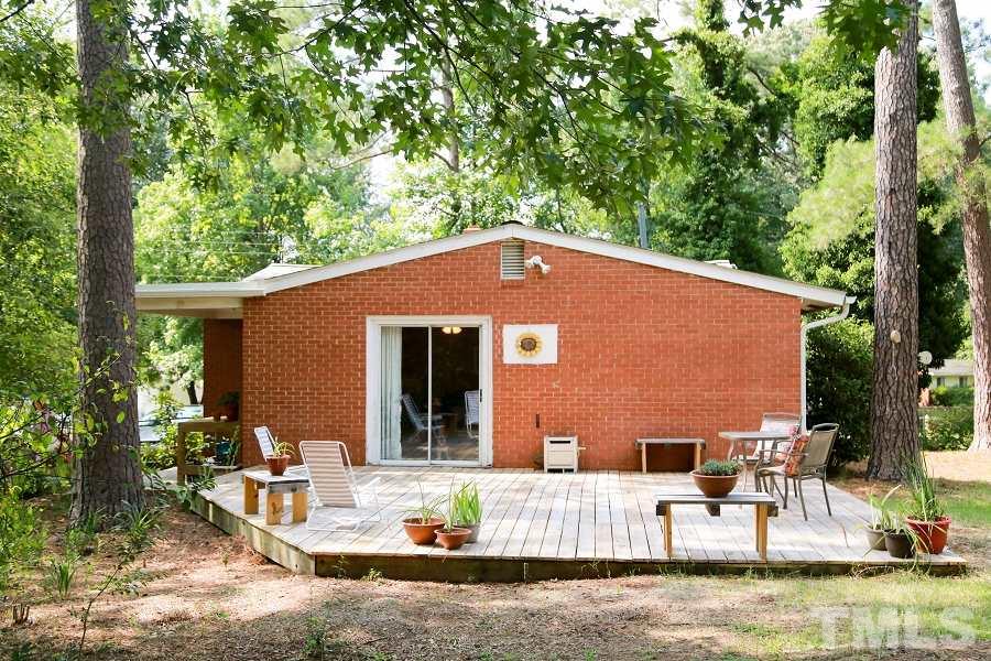 1501 Kelly Road Garner, NC 27529 - Photo 25 of 25 a view of a patio with couches table and chairs and potted plants
