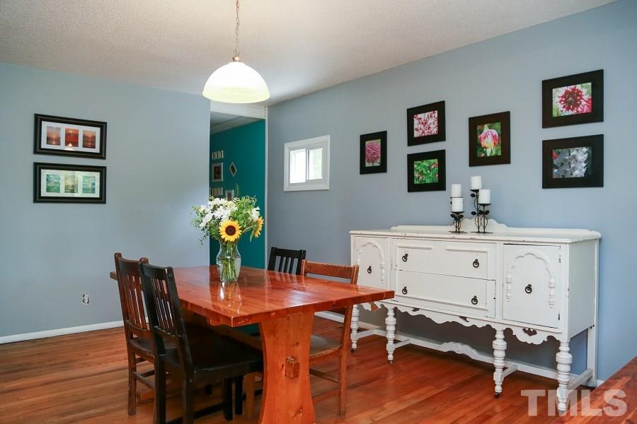 1501 Kelly Road Garner, NC 27529 - Photo 4 of 25 a dining room with furniture and window